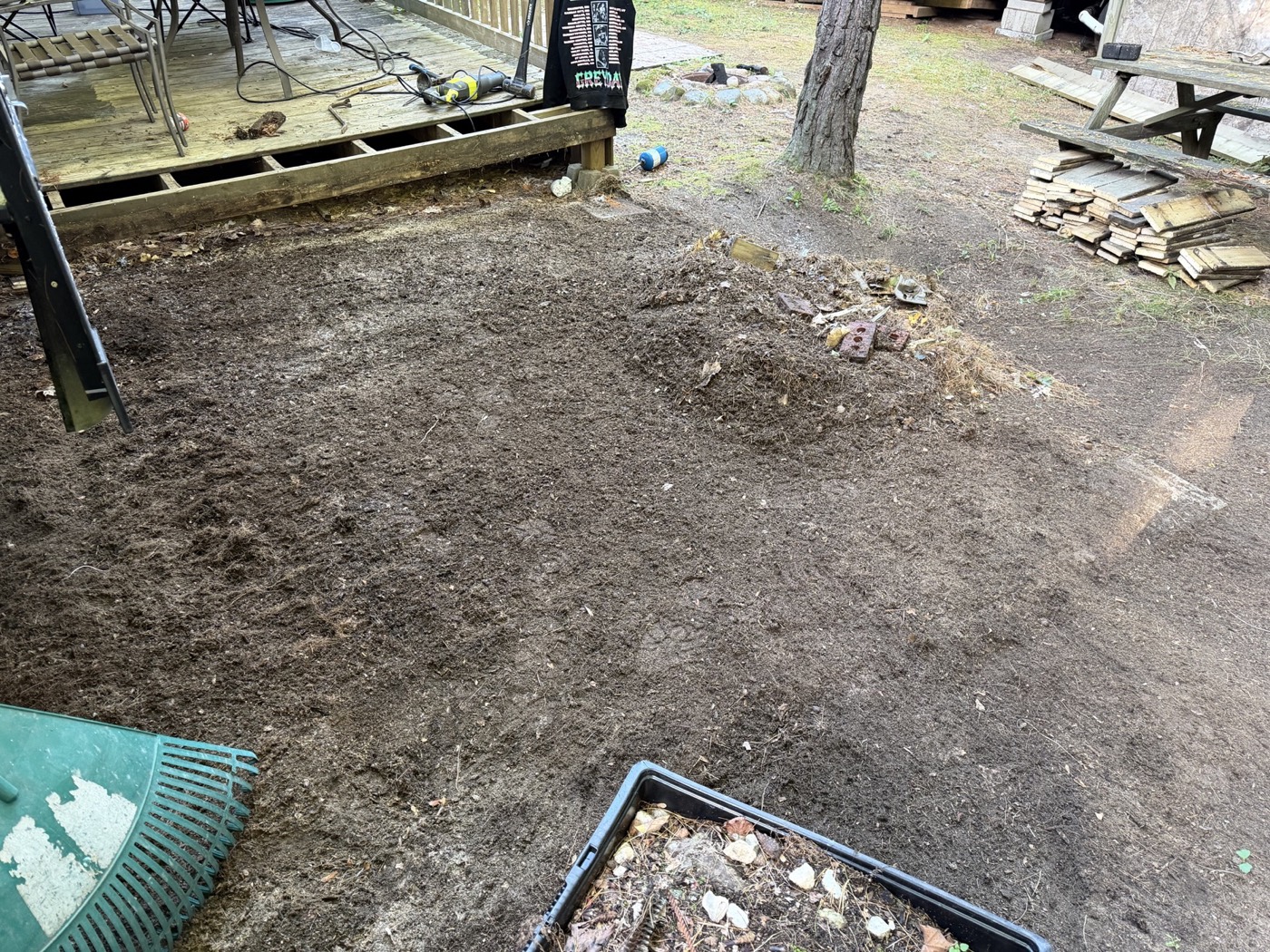 Cleared ground after the deck demolition and cleanup