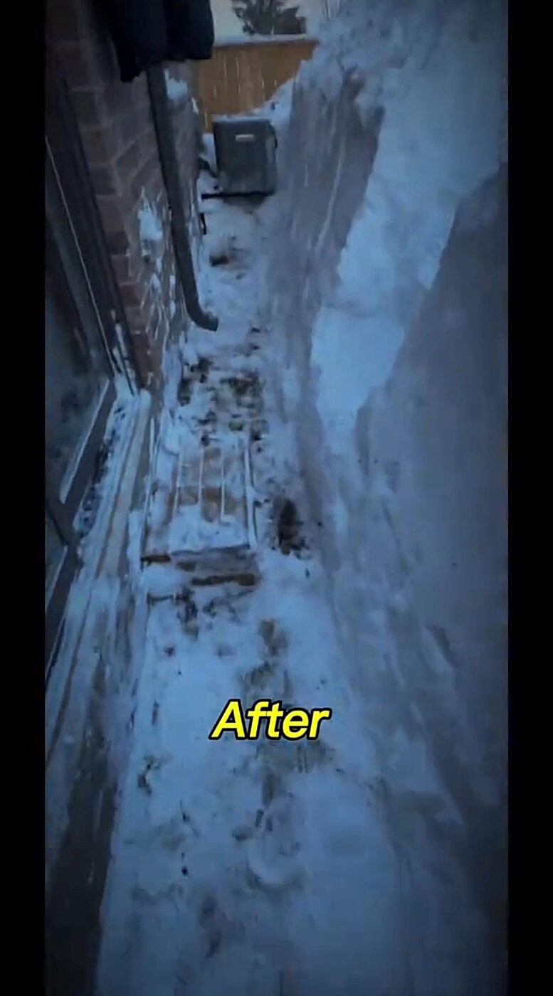 Walkway cleared through deep snow after service